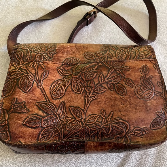 Patricia Nash
Beaumont Flap Burnished Tooled Crossbody, EUC - Picture 12 of 12